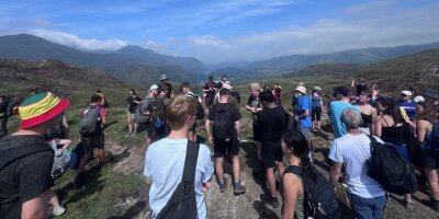 Group of LV colleagues looking over a hilly terrain in North Wales