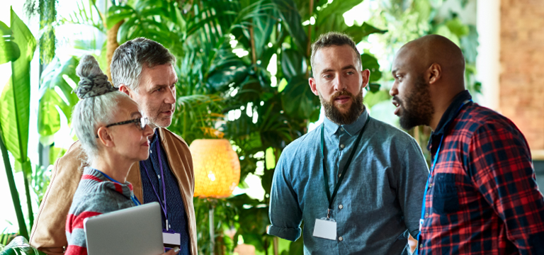 colleagues talking in a group