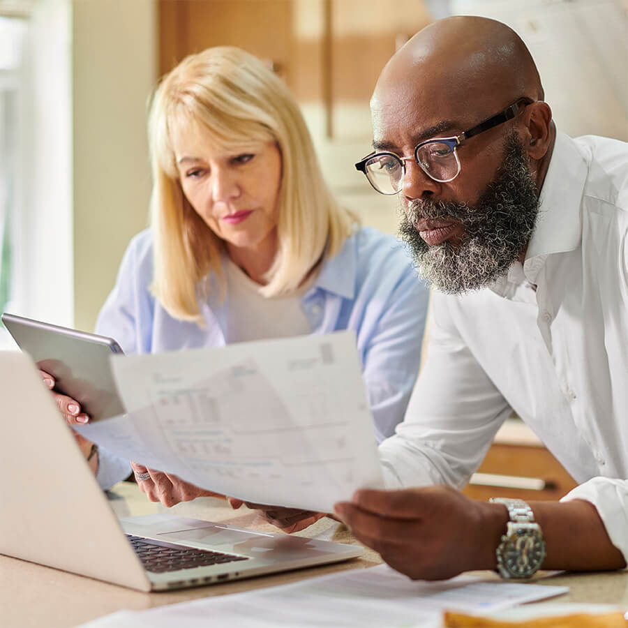 Man and woman looking at laptop