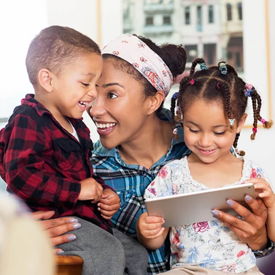 Family playing on iPad