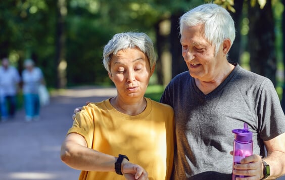 elderly-couple-walking-564x356