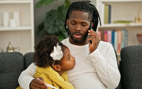 Man on the phone with his daughter