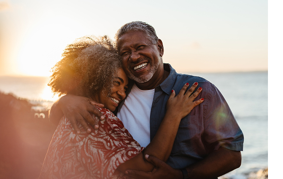 Couple smiling in sunset