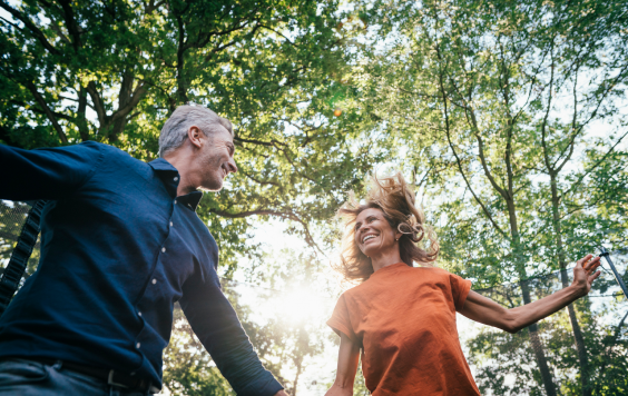 Happy couple in the forest