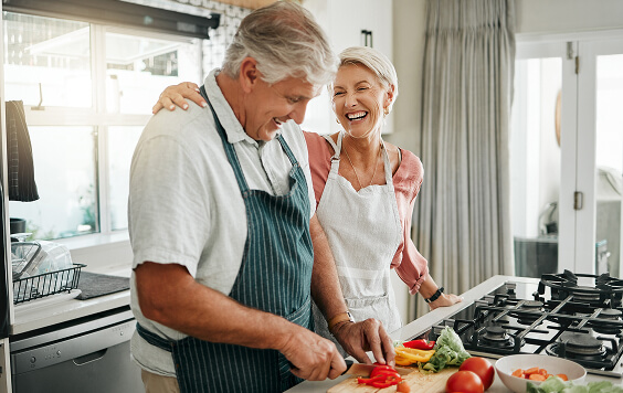 Older couple cooking in the kitchen