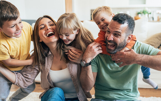 Family playing together inside
