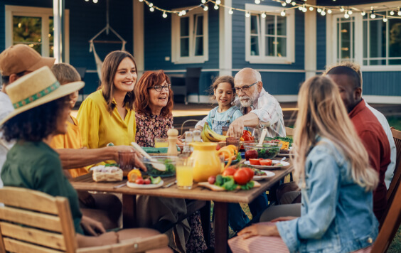 Family sat around a table full of food