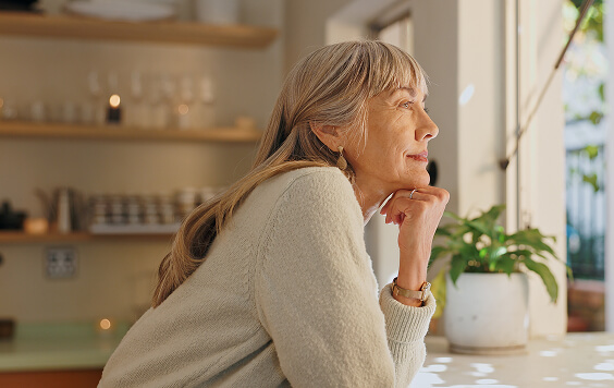 Woman looking out a window