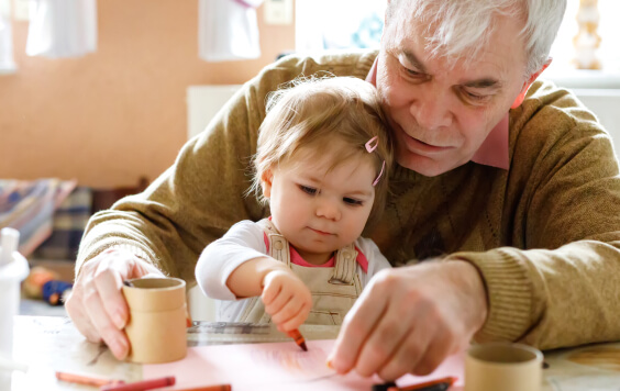 Grandad drawing with his grandchild