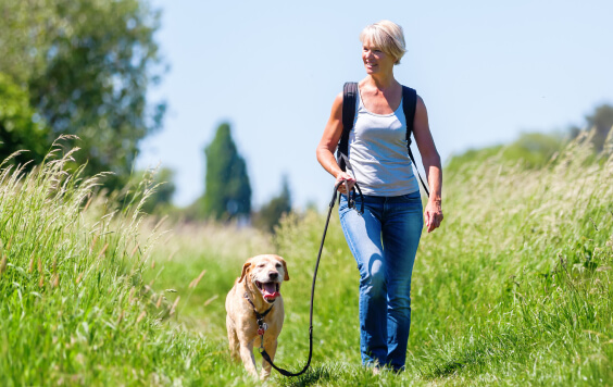 Woman walking her dog