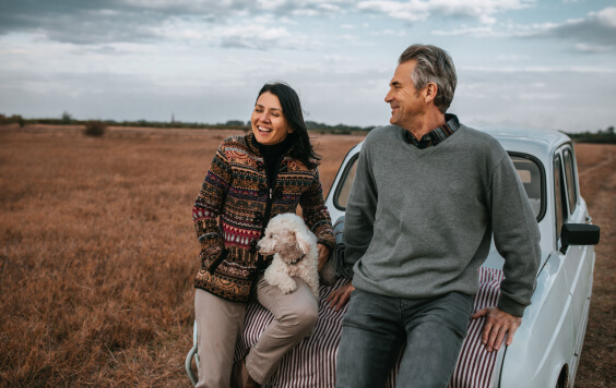 Couple spending time with their dog