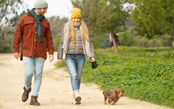 young-couple-on-a-dog-walk