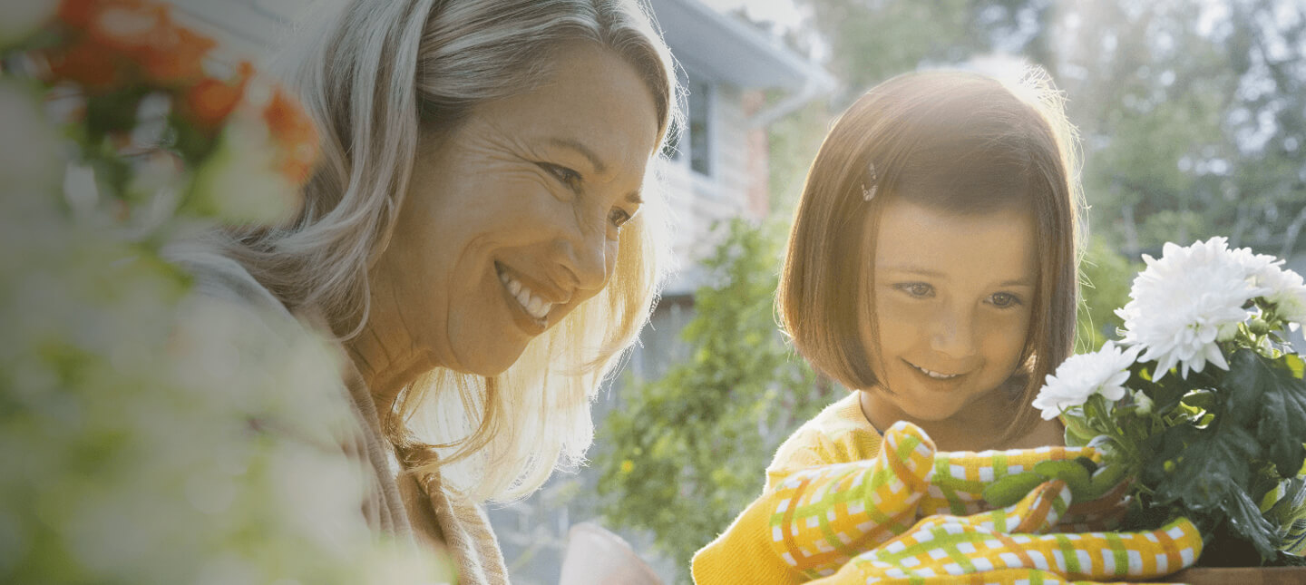 Woman and child gardening