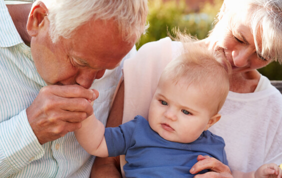 Grandparents with their grandchild