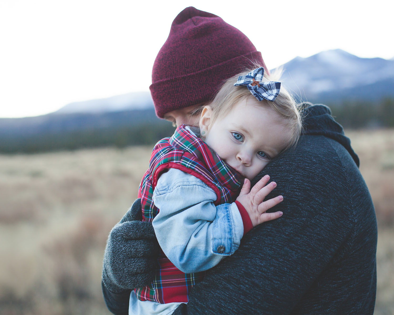 Child being comforted by parent