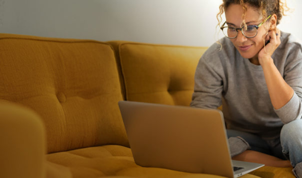 Woman reading laptop