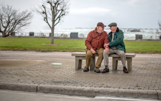 Older couple sat on a bench