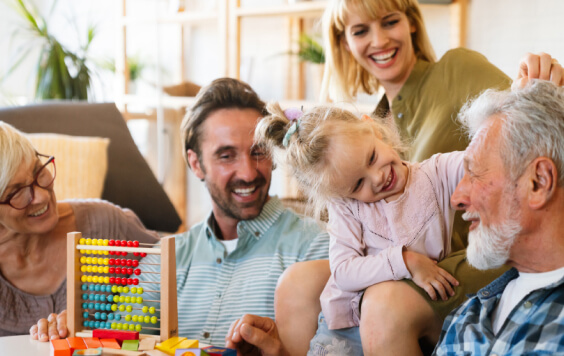 Family laughing and playing together