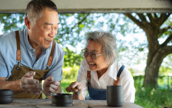 Couple doing pottery