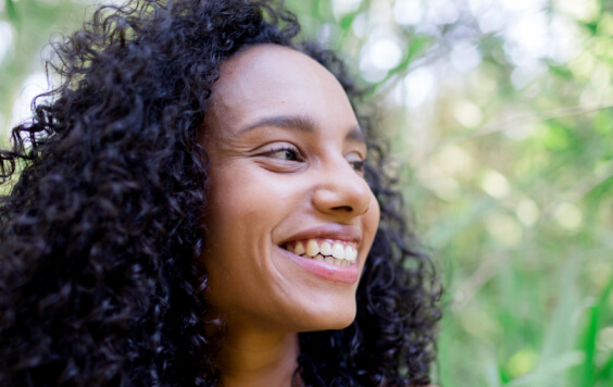Woman smiling outdoors