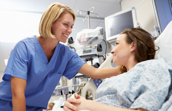 Nurse placing hand on patient's shoulder
