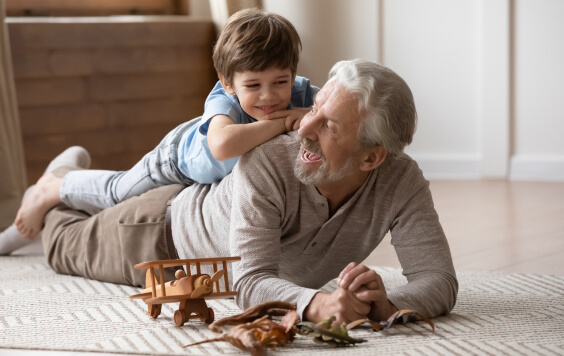 Boy playing with his dad