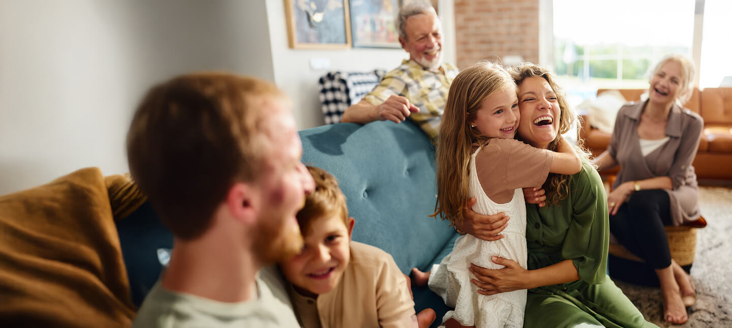 happy-mother-and-daughter-embracing-during-family-time